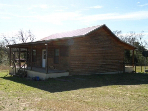 10 Acres with 1 bedroom plus loft, 2 bath log cabin
